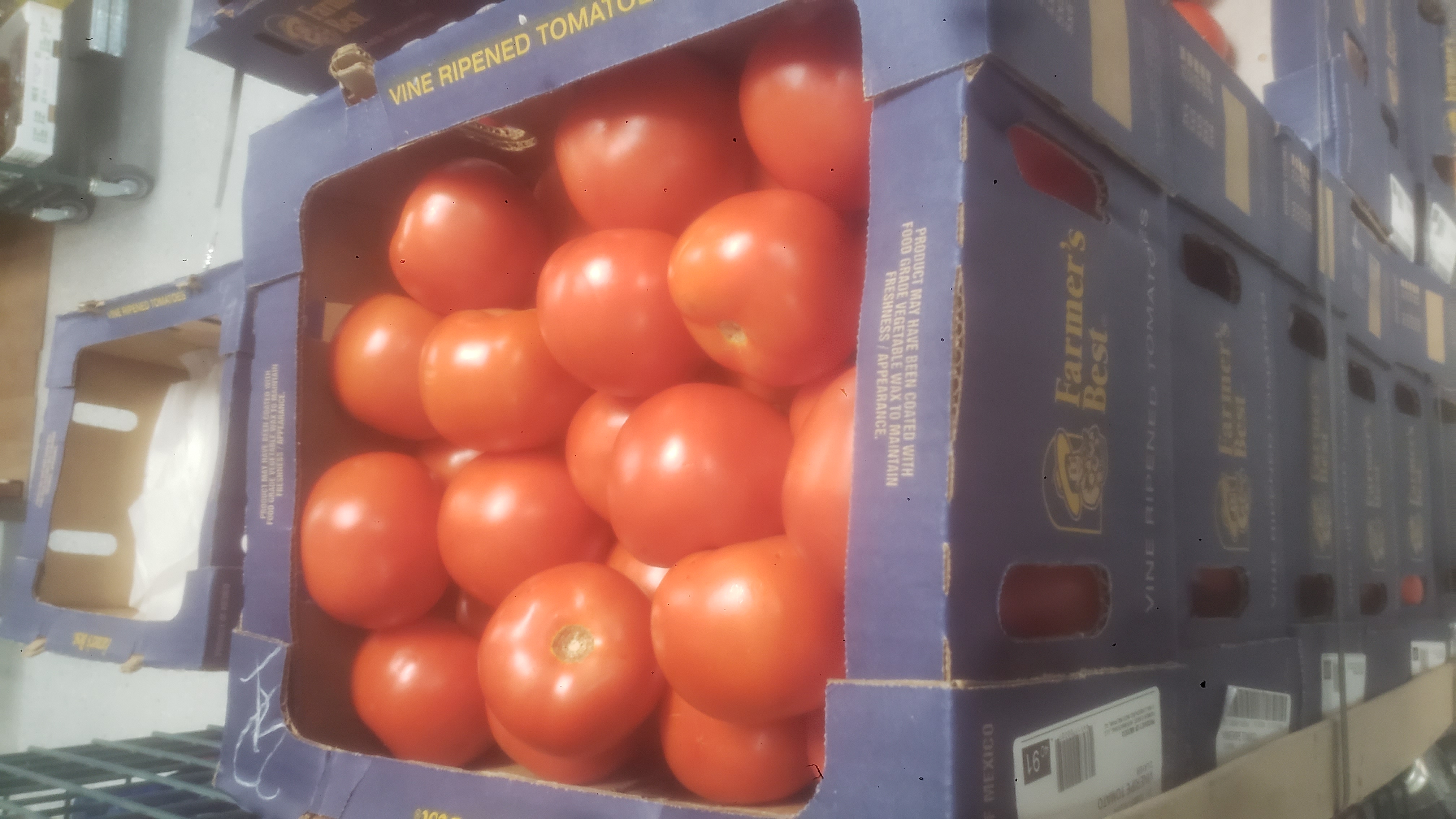 Produce tray of tomatoes.